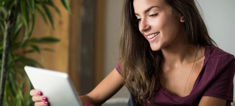 girl looking at computer